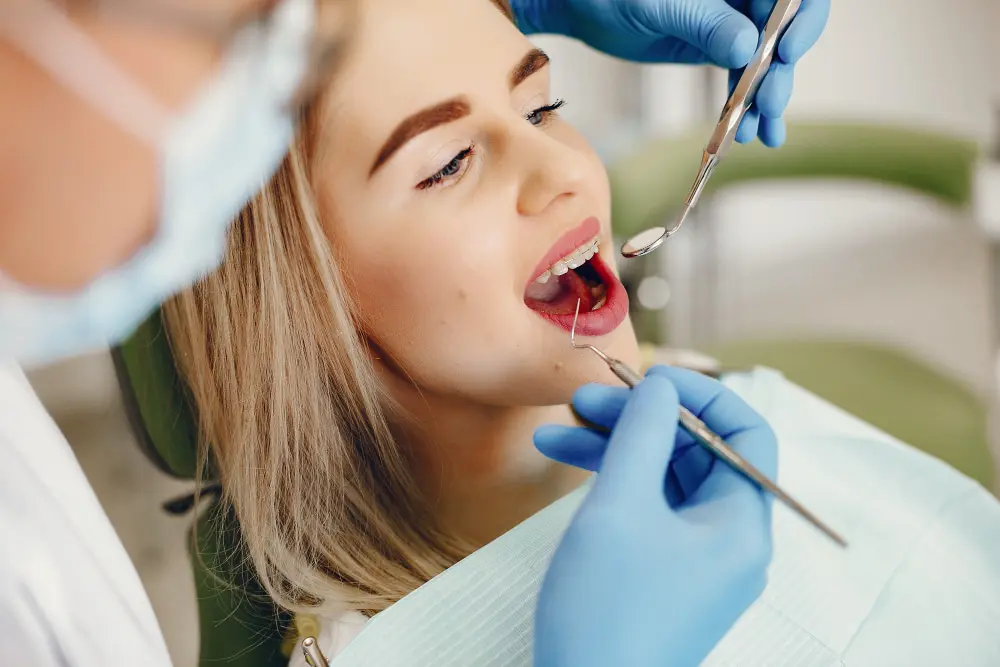 a woman getting her teeth checked