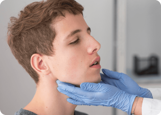 Smiling young patient going through orthodontic treatment and jaw surgery for facial alignment correction