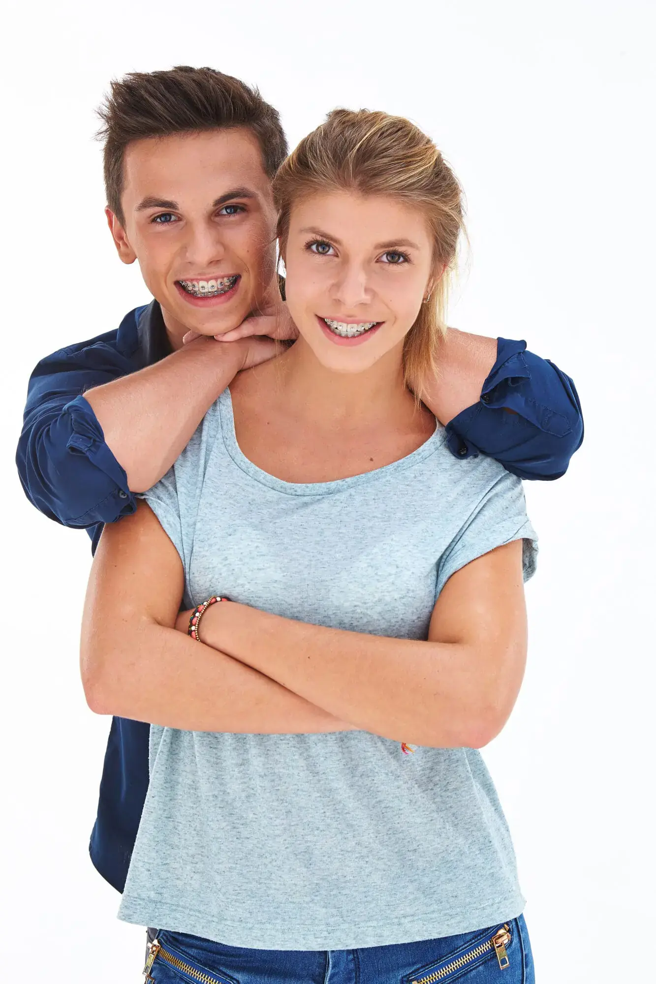 Smiling teenage boy and girl wearing braces, representing teen orthodontic care at Limestone Hills Orthodontics in Austin, TX. Smiling teenage boy and girl wearing braces, representing teen orthodontic care at Limestone Hills Orthodontics in Austin, TX.
