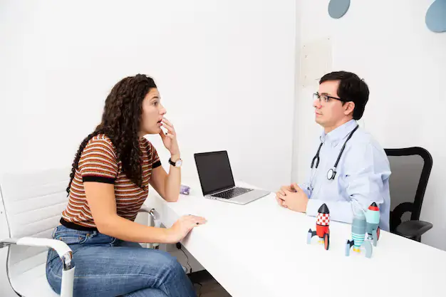 Young girl receiving a dental examination for tongue thrust assessment, with myofunctional therapy options available at Limestone Hills Orthodontics in Austin, TX. Young girl receiving a dental examination for tongue thrust assessment, with myofunctional therapy options available at Limestone Hills Orthodontics in Austin, TX.