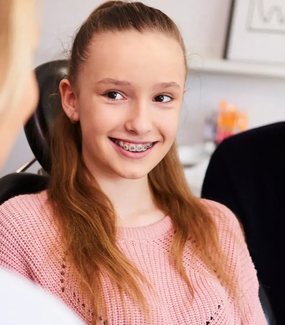 Rodrigo F. Viecilli: Orthodontist in Austin TX Child with braces at Limestone Hills Orthodontics, Austin, TX. Affordable Cost and insurance options for braces and Invisalign.