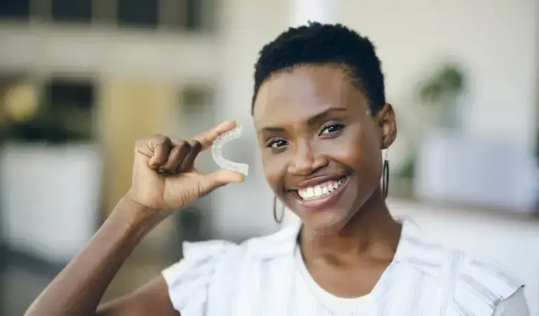 Close-up of Invisalign invisible braces at Limestone Hills Orthodontics in Austin, TX, offering comfortable and discreet orthodontic treatment. Close-up of Invisalign invisible braces at Limestone Hills Orthodontics in Austin, TX, offering comfortable and discreet orthodontic treatment.