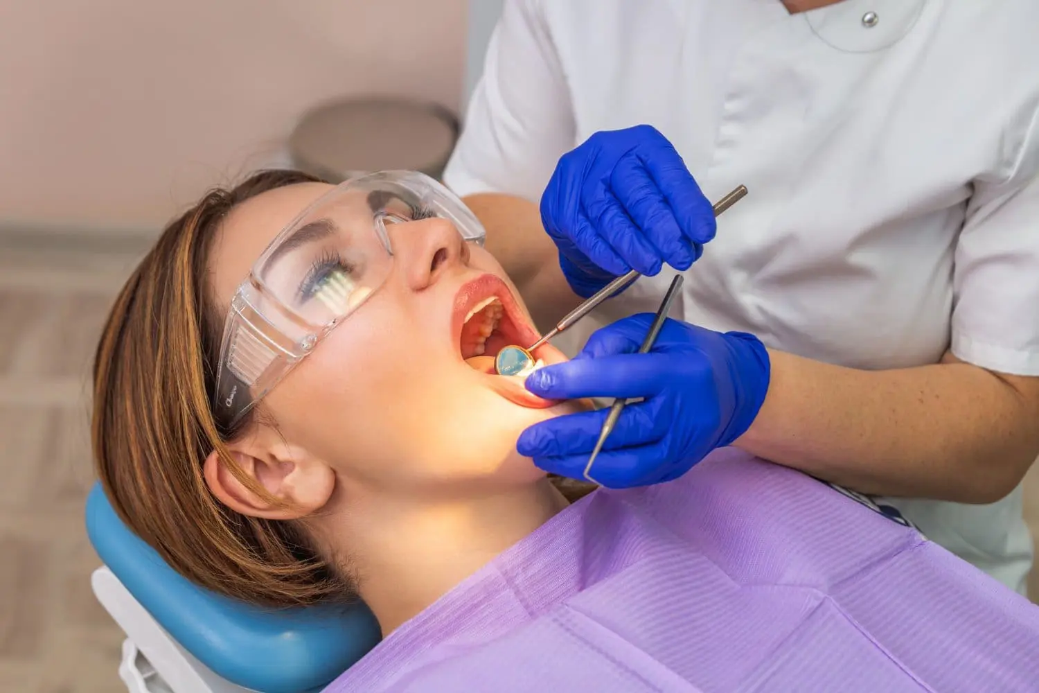 An orthodontist providing same-day emergency dental care for a patient with braces at Limestone Hills Orthodontics.
