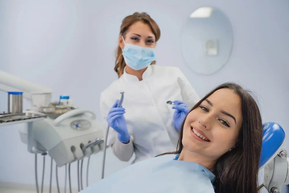 young woman patient orthodontist - Signs Your Child Needs Braces: 10 Things Parents Should Watch
